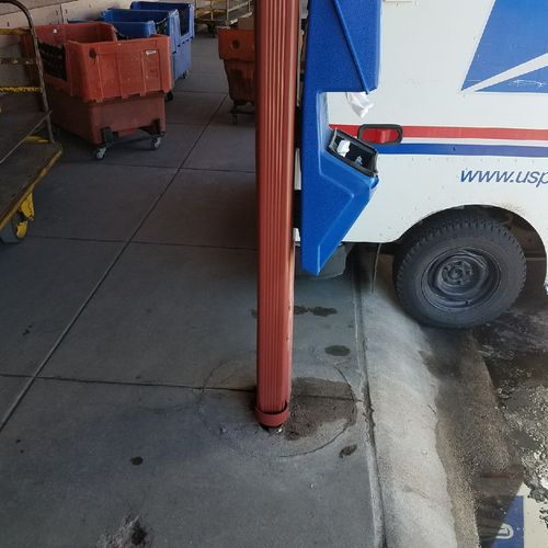 A downspout that we replaced at a Post Office in C