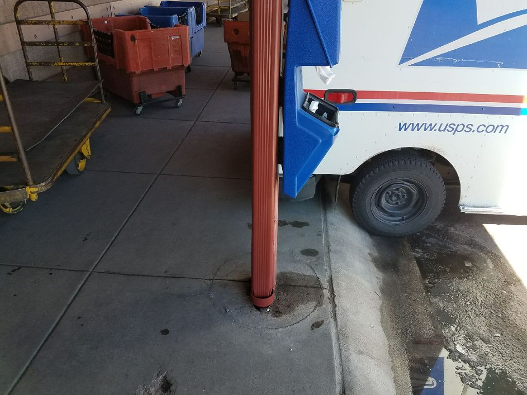 A downspout that we replaced at a Post Office in C