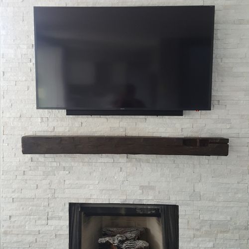 Custom TV installation with all wiring concealed.