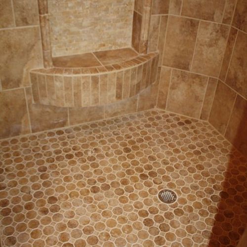 Custom Shower with a mosaic floor.