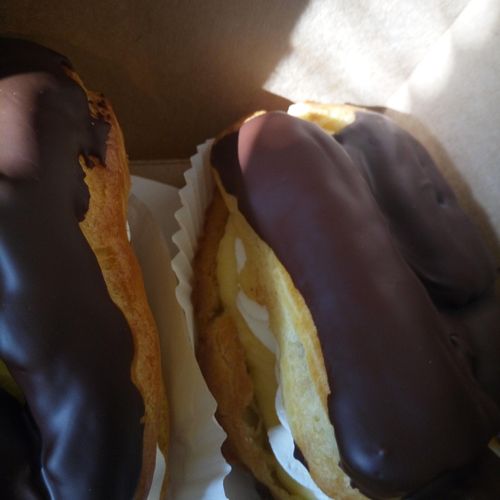Large Eclairs filled with Custard and whip cream d