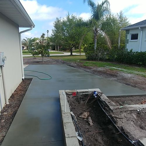 Driveway addition/add-on with new sidewalk to home