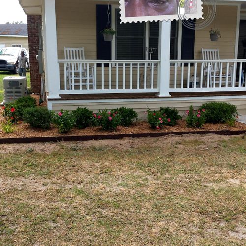 End this photo new edging  mulch and flowers are i