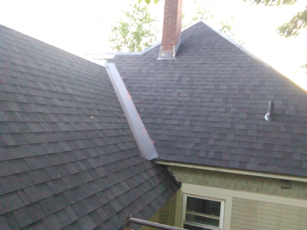 Stripped slate and put back shingles....   Barre V