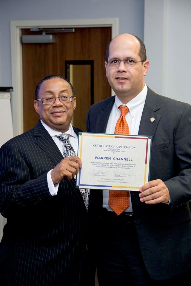 Chief Judge Belvin Perry presenting award for serv