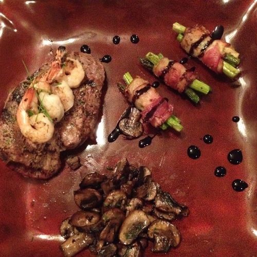 Grilled beef and chimichurri shrimp, shallot saute