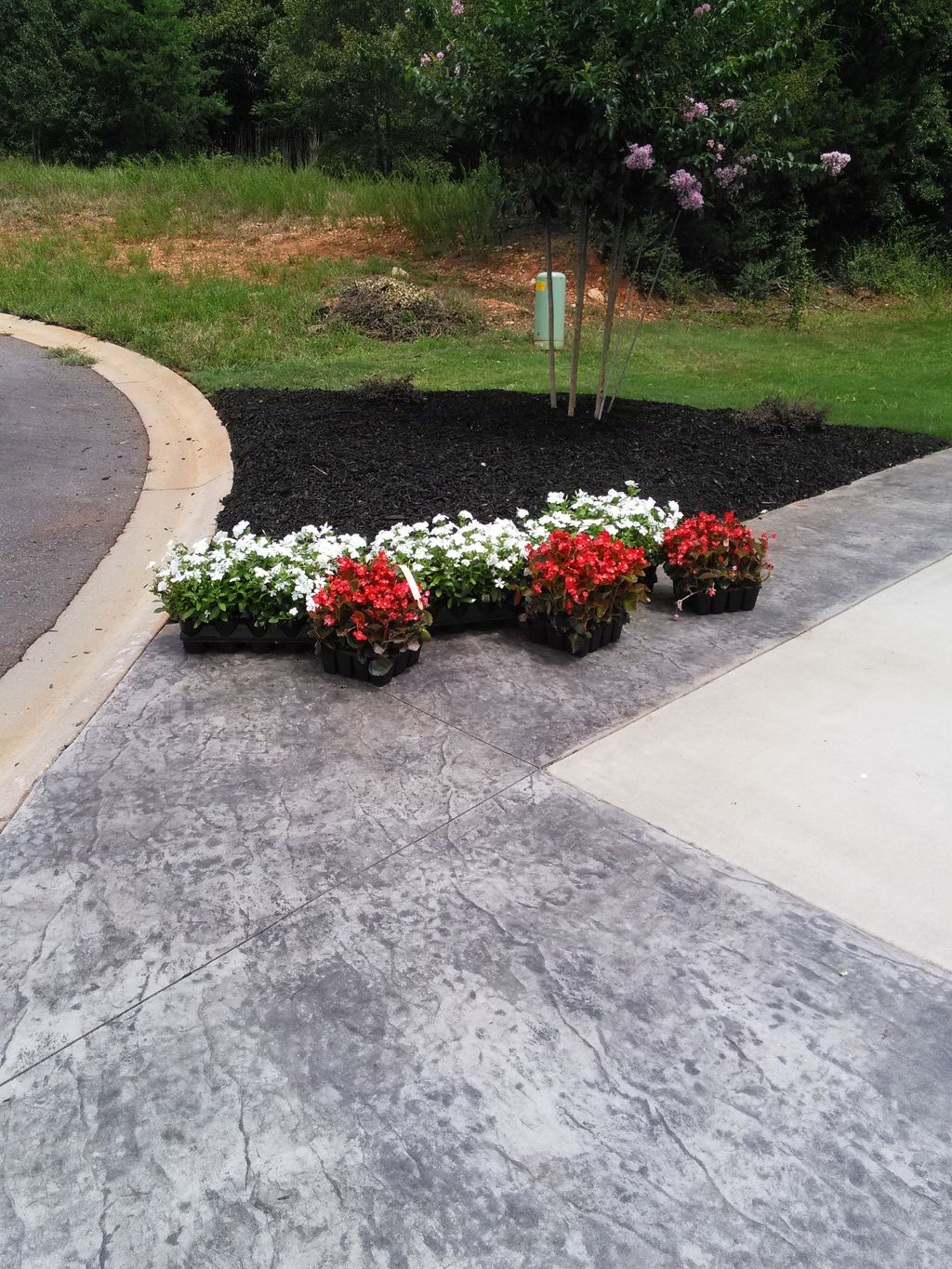 mulch and flowers installed on 7/29/2016