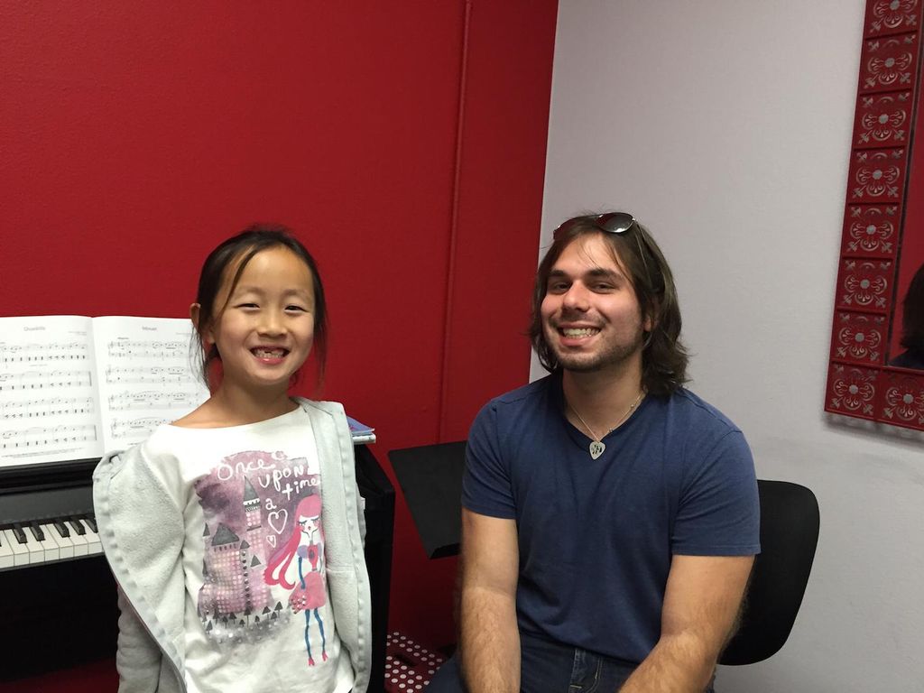 Claire Wang. Student of the month with teacher Dav