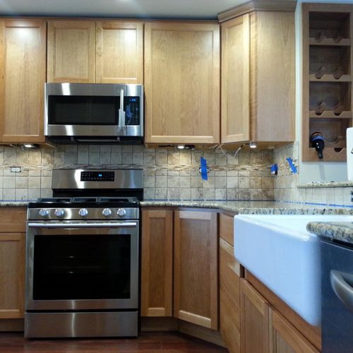 This complete kitchen remodel includes Cherry cabi