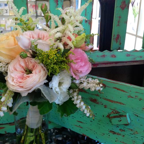 Bridal bouquet with garden roses, astilbe, ranuncu