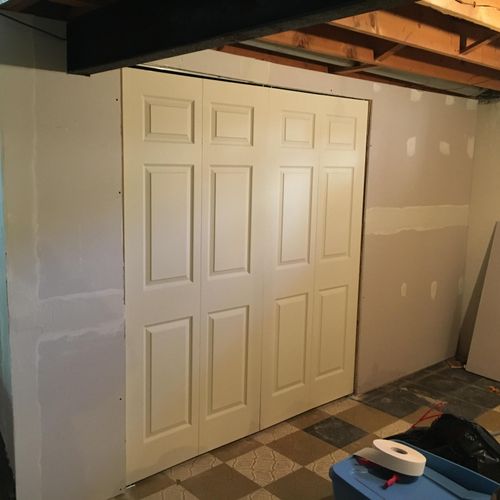 Constructed wall, drywalled and installed closet d