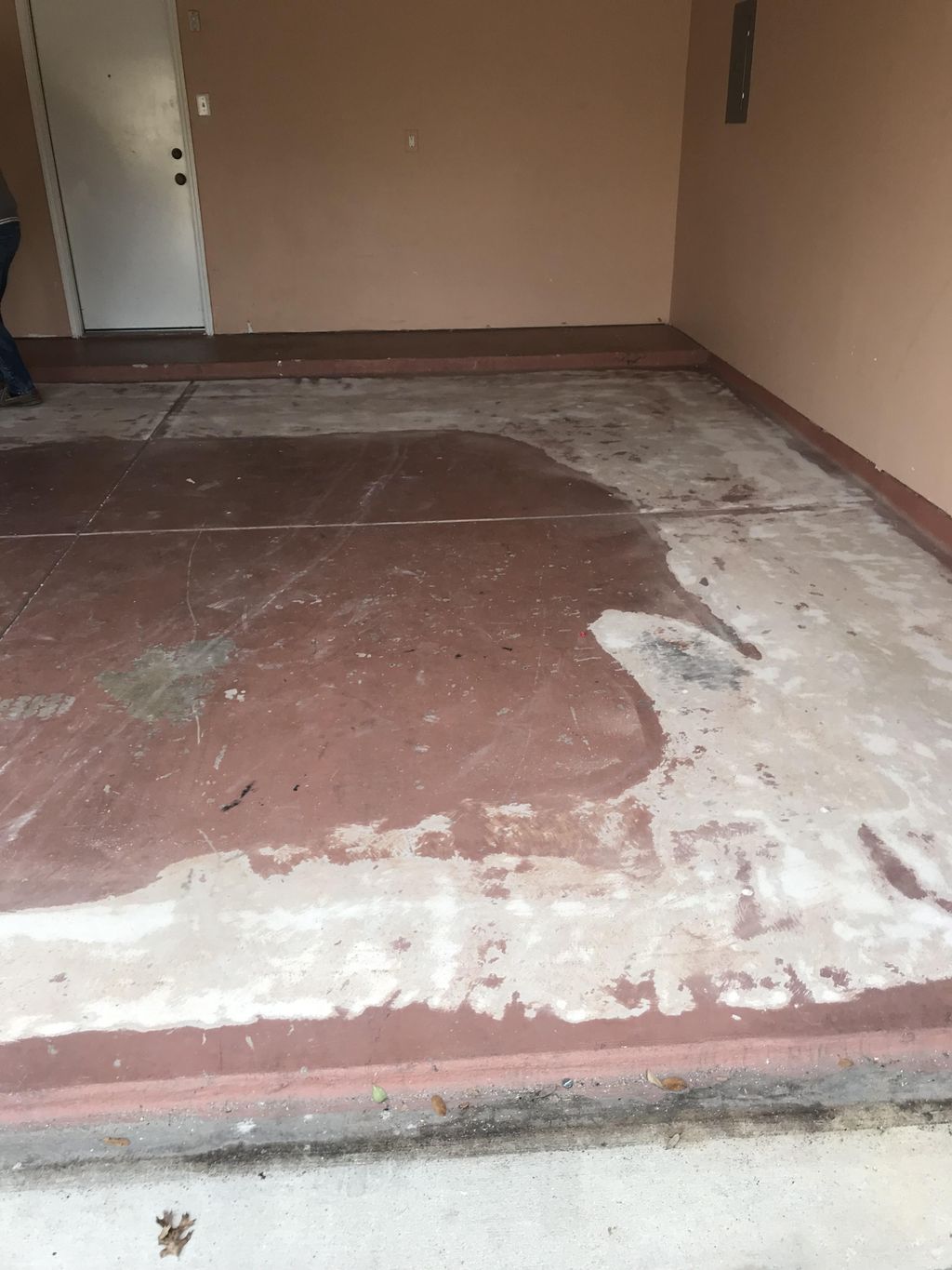 Before - Grinding off an old and failing epoxy flo
