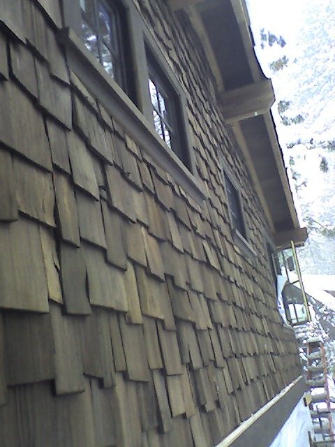 Removing old siding and installing new siding give