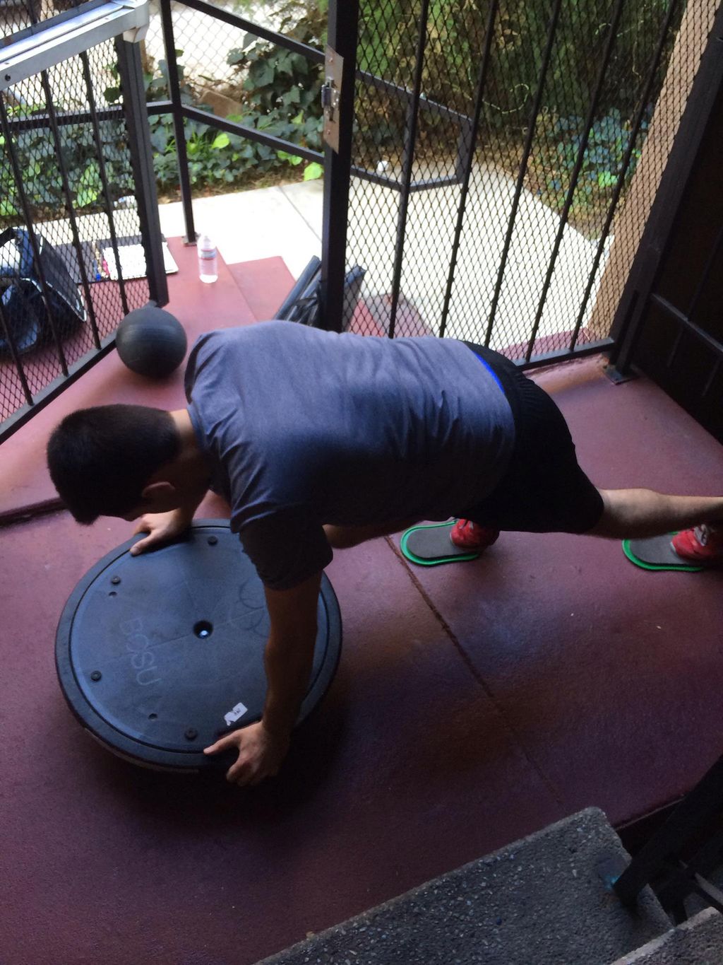 Client Narbeh doing some moutain climbers on slide