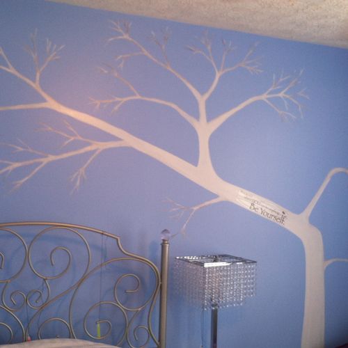 White tree on my daughters bedroom wall over her b