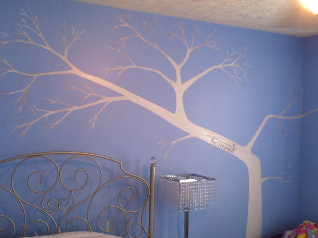 White tree on my daughters bedroom wall over her b