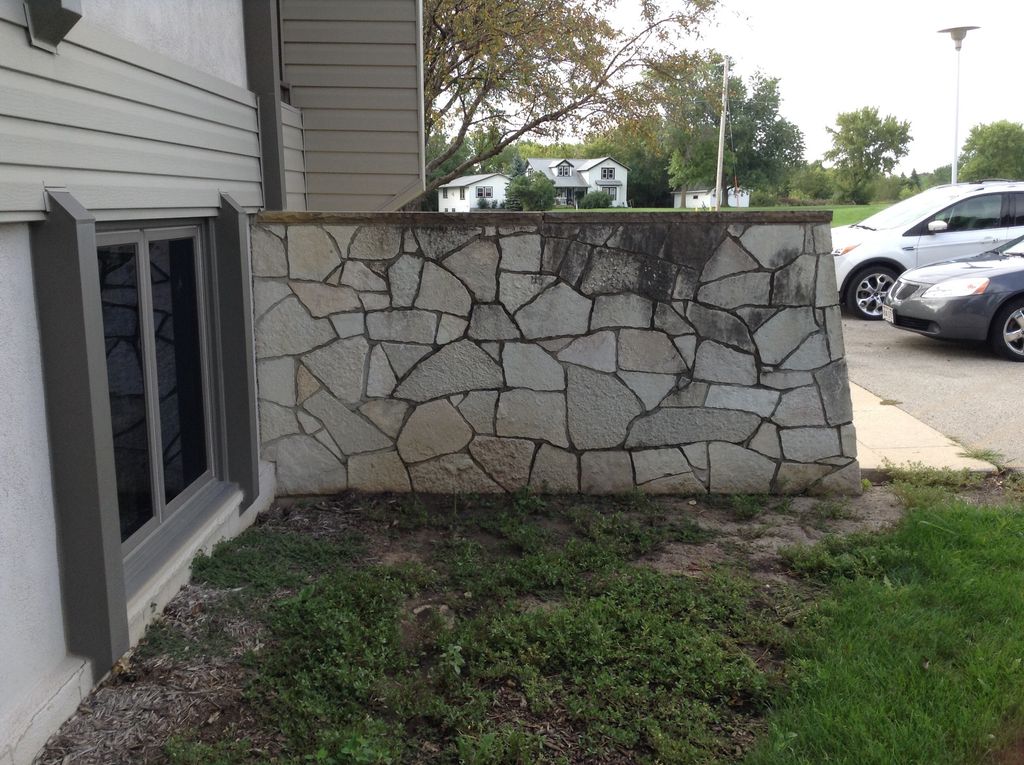 A 45 year old stone wall in SE Wisconsin needed de