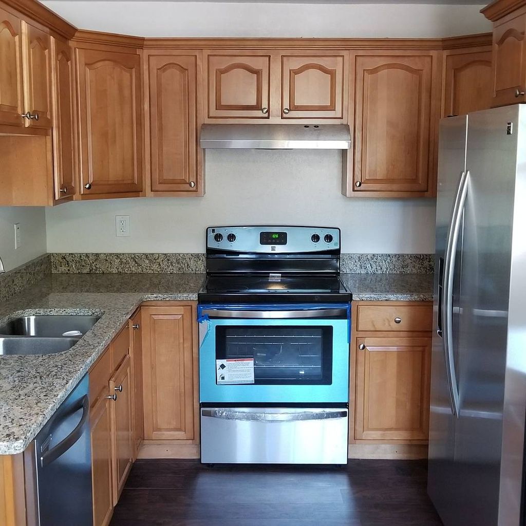 Cabinet refinishing, stove and dishwasher installa