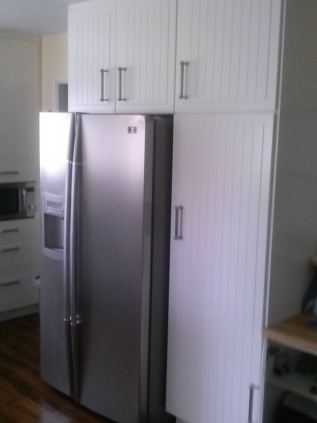 This is a total kitchen remodel, pantry upper refr