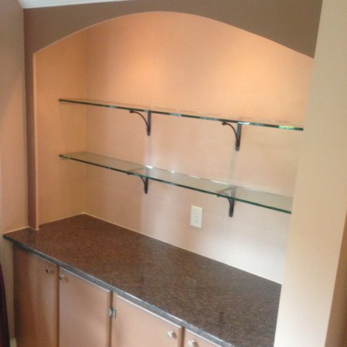 Cabinet with granite top, glass shelves and led li