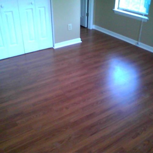 This is a laminate flooring install completed by K
