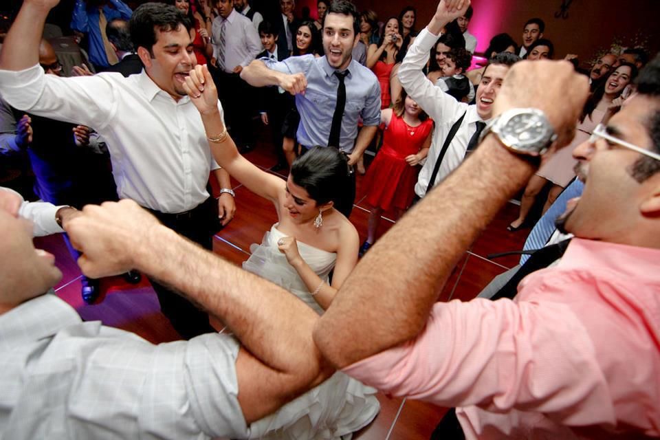 A bride having a great time on the dance floor at 