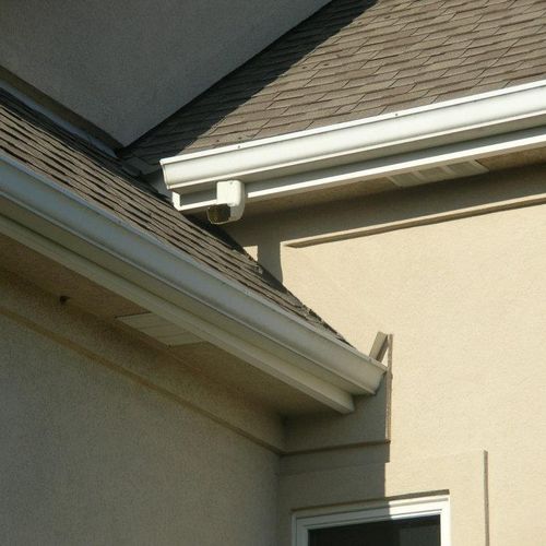 This pic shows the roof, metal flashing, gutter an