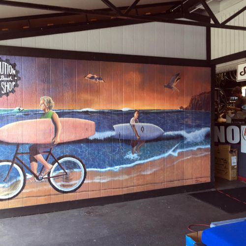 large mural at revolution Bike Shop in Solana Beac