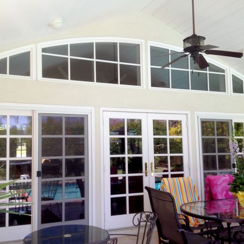 3 French doors and arched transom on covered pool 