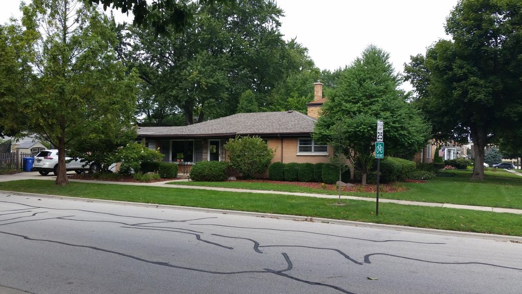 Roof replacement with low pitch section