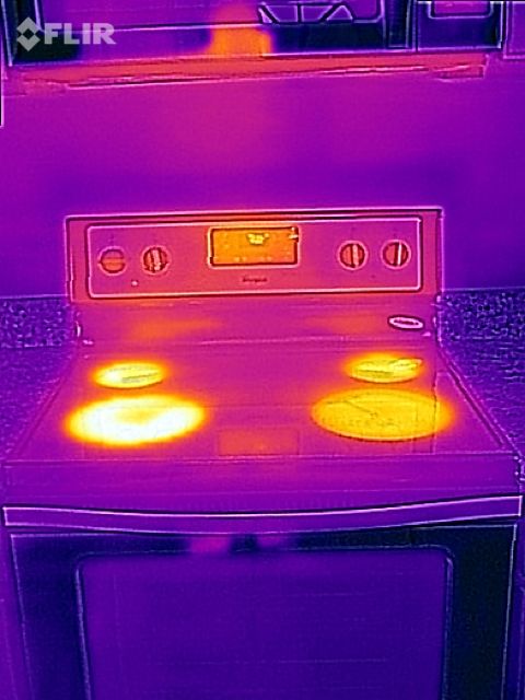 This shows an infrared thermal image of a stove wo