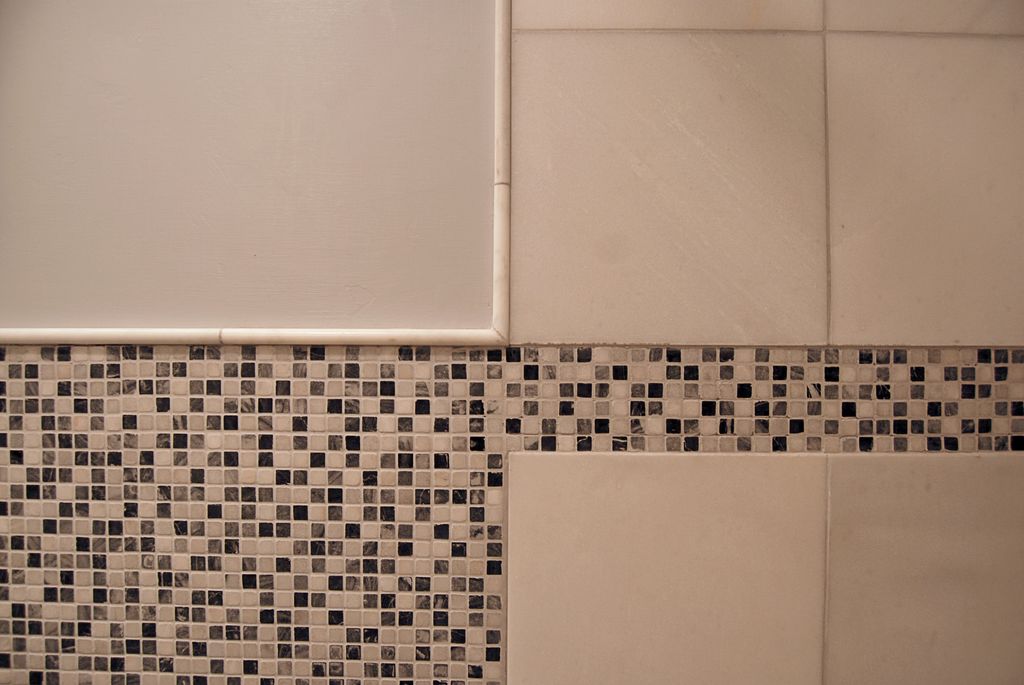 Custom design of intersection of tub surround with