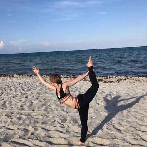 Yoga on the beach is one of the best ways to get g