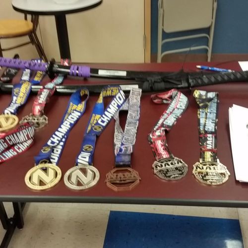 A few of our competition medals and swords