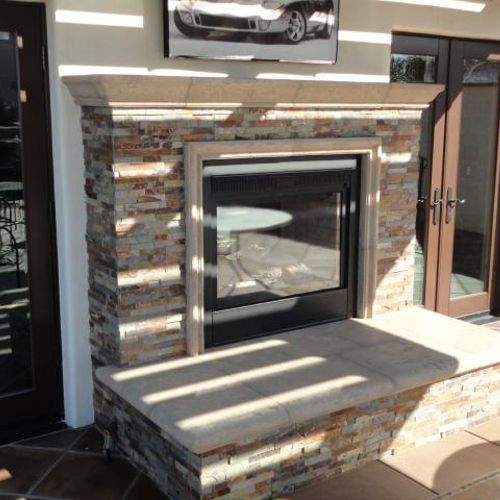 1) Exterior Aged finish fireplace and large seatin