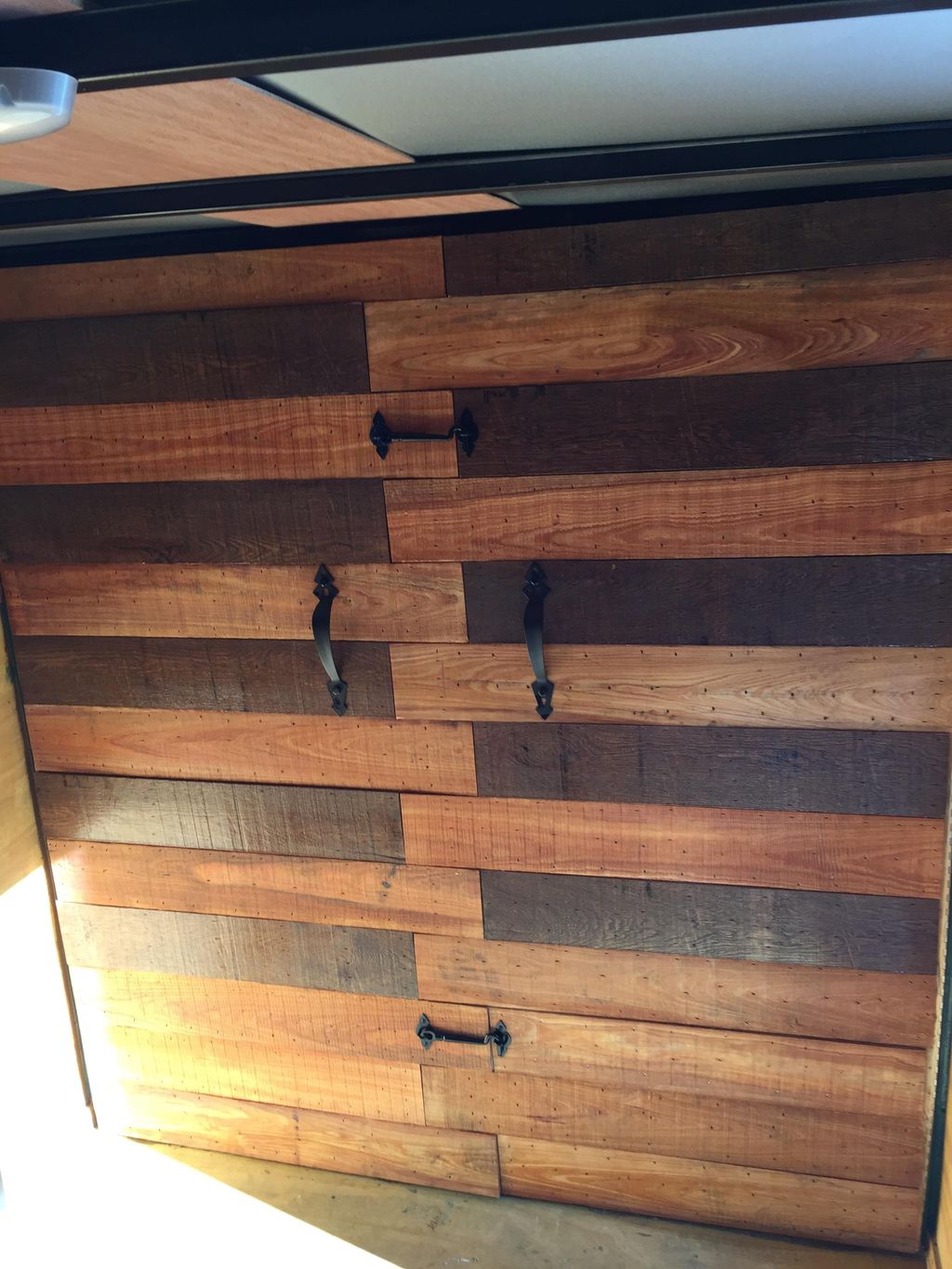 Handmade Cedar interlocking door in 12 foot traile