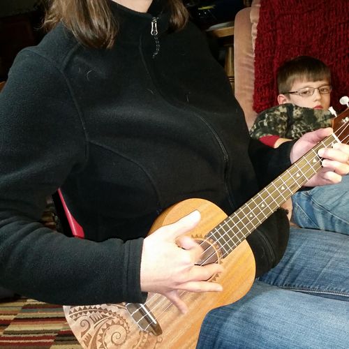 Mom of a mom/son duo. Learning ukulele on tenor uk