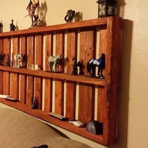Decorative wall shelf. Full length of couch.