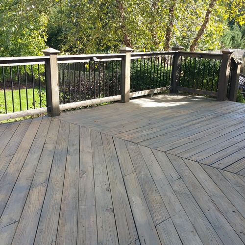 Removed old paint from deck then power washed and 