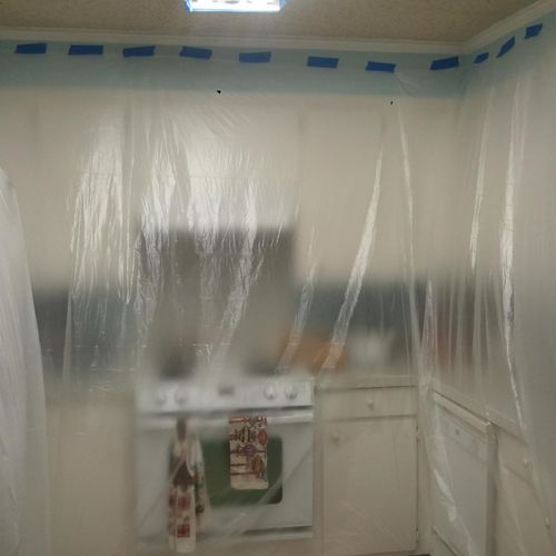 taped and covered whole house to spray popcorn cei