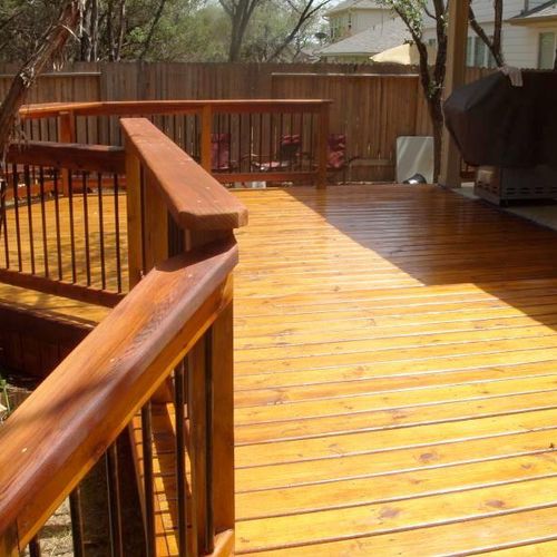 Refinished deck with cedar tone deck toner (Stain)