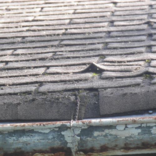 This is a three tab asphalt shingle roof and it wa