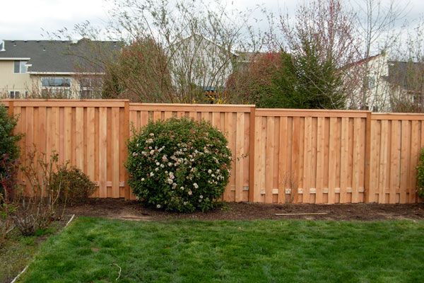 6 ft. shadow-box-style cedar fence with top & bott