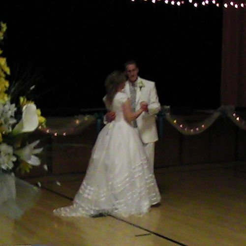 The Happy Couple enjoying their dance together.