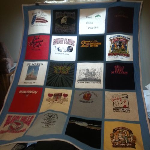 T-shirt quilt, queen size. Made with many differen
