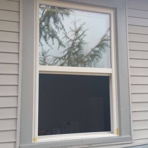 Aluminum window trim wrap to cover defects in wood