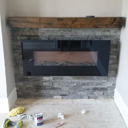 Wall-mount fireplace, with custom tile surround an