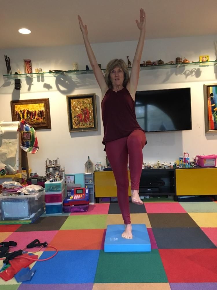 Hip and ankle balance exercise on airex pad