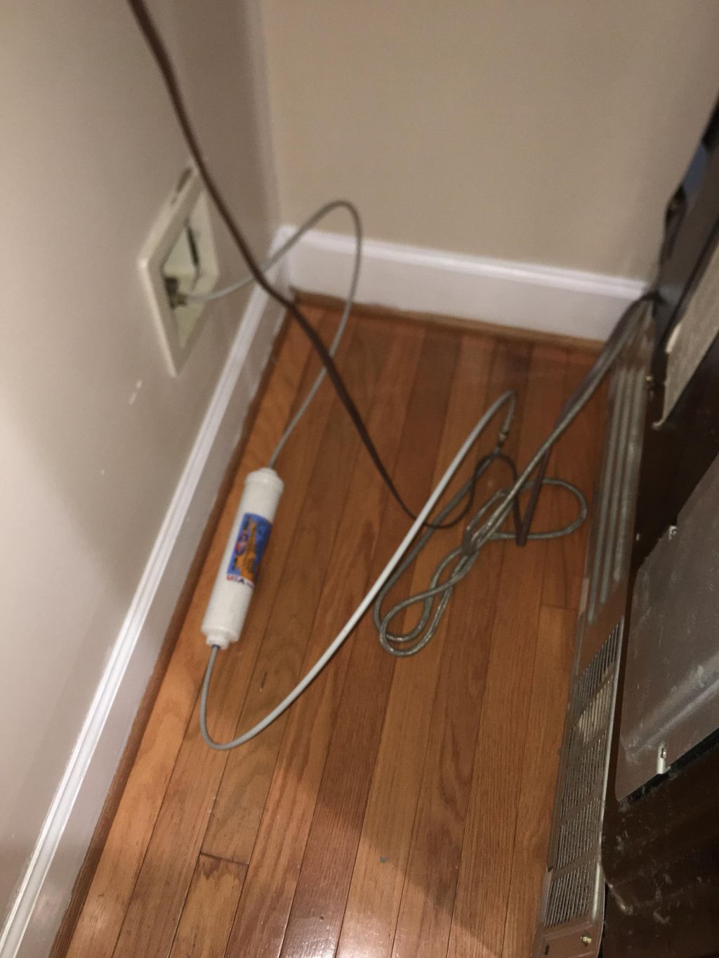 Behind the fridge 