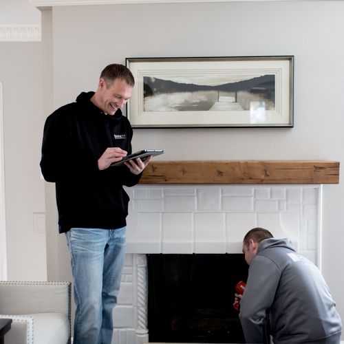 Jarred and Jason checking fireplace